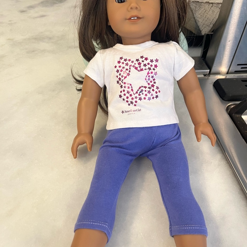 American Girl Doll with Brown Hair and Orange Outfit - Picture 5 of 6